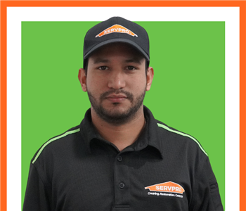 servpro employee against green background